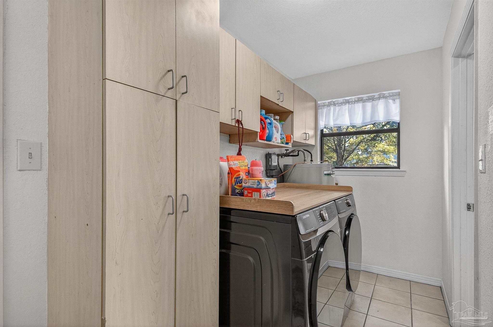 4807 Jennifer Lane Pace, FL 32571 - Photo 23 of 49 a utility room with dryer and washer