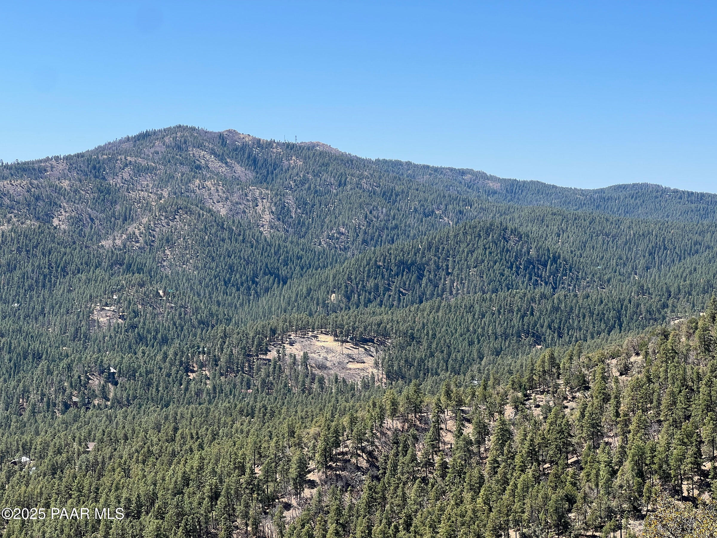 33 East Bald Mountain Road Prescott, AZ 86303 - Photo 16 of 21 a view of a mountain in the distance in a field