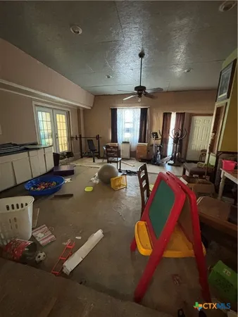 a room with gym equipment and a mirror