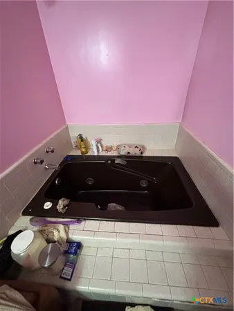 a room with furniture and screen