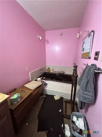 a room with furniture and a flat screen tv