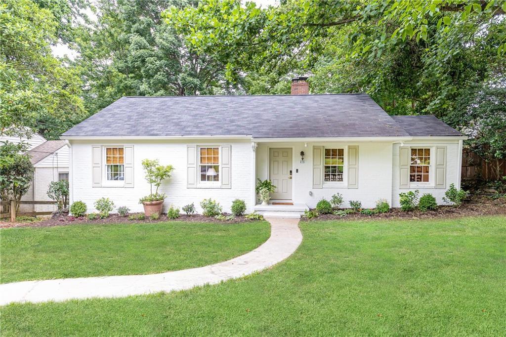 a house view with a garden space