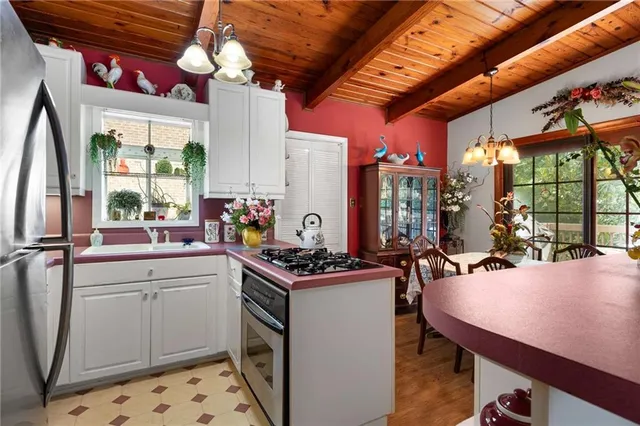 a view of a kitchen and dining room