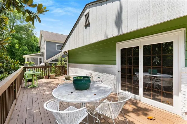 a bathroom with a toilet and a bathtub