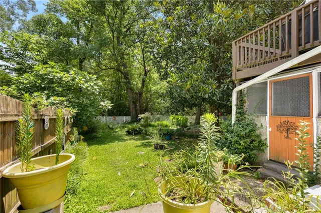a backyard of a house with lots of green space
