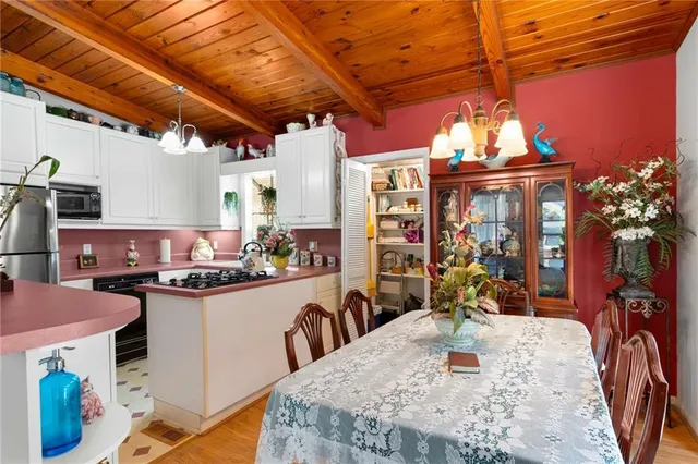 a view of a dining room with furniture