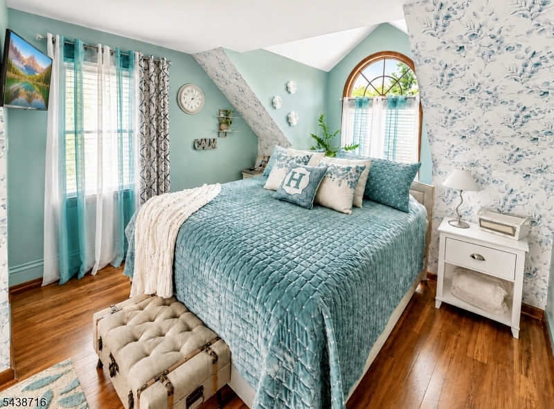 11 Rippling Brook Drive Vernon, NJ 07422 - Photo 19 of 49 a bedroom with a large bed and a window