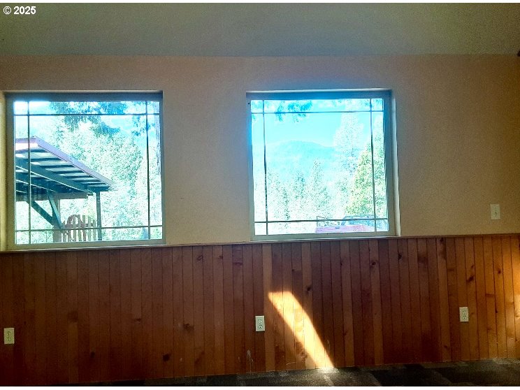 4580 Old House Creek Road Agness, OR 97406 - Photo 11 of 46 a view of a large window with an outdoor space
