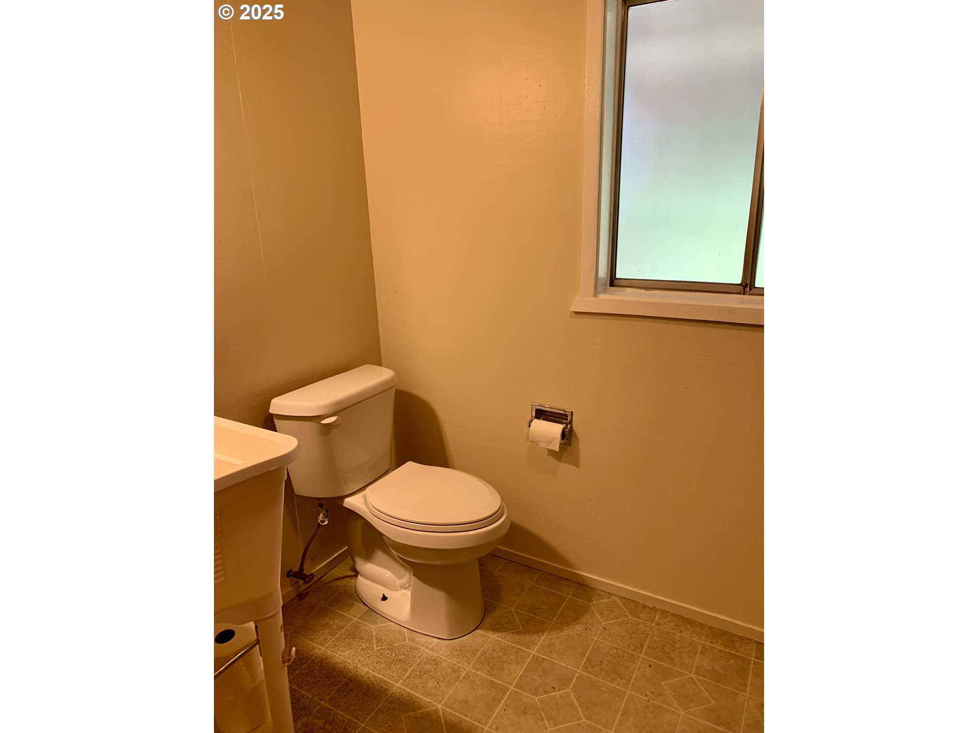 4580 Old House Creek Road Agness, OR 97406 - Photo 23 of 46 a bathroom with a toilet and a mirror