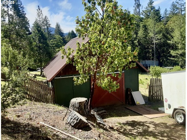 4580 Old House Creek Road Agness, OR 97406 - Photo 30 of 46 a view of outdoor space and yard