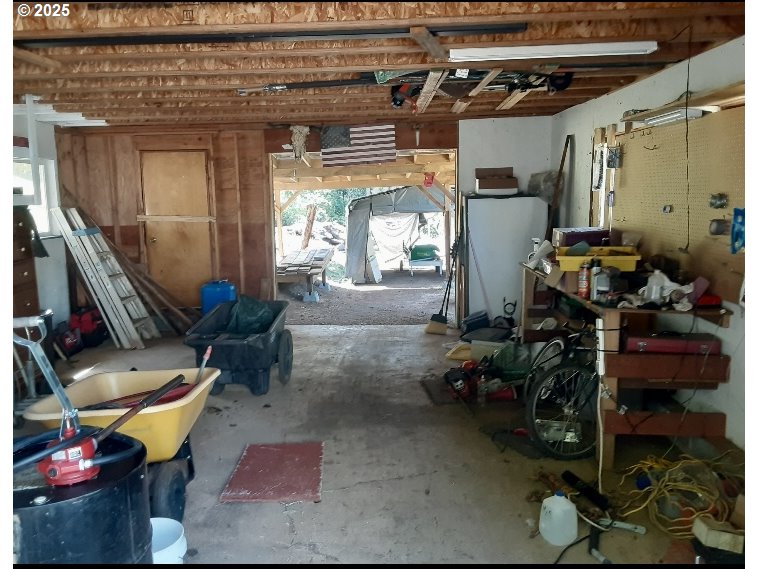 4580 Old House Creek Road Agness, OR 97406 - Photo 31 of 46 a living room filled with furniture