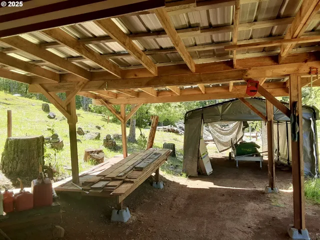 a view of a backyard of the house