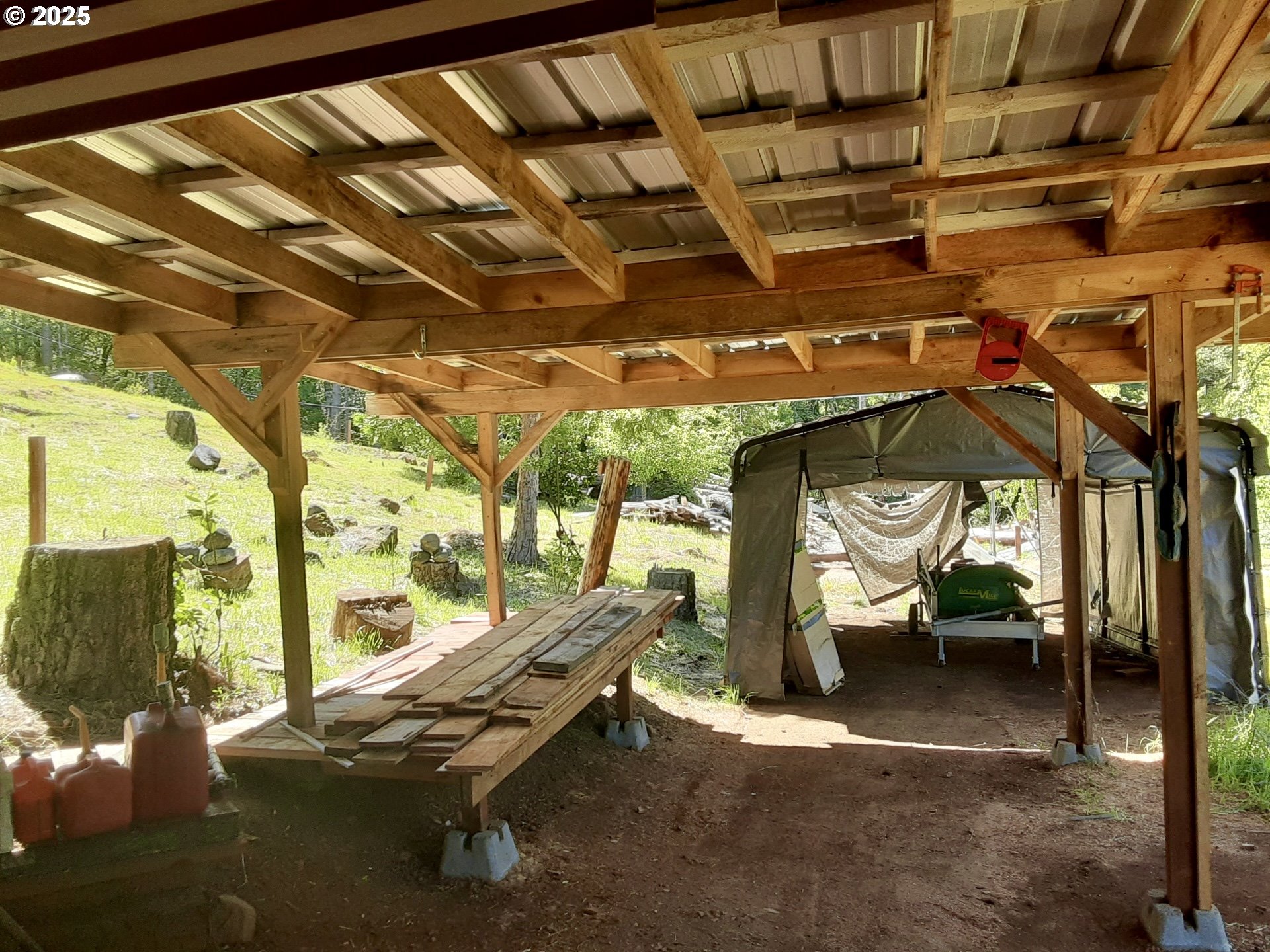 4580 Old House Creek Road Agness, OR 97406 - Photo 32 of 46 a view of a room with gym equipment