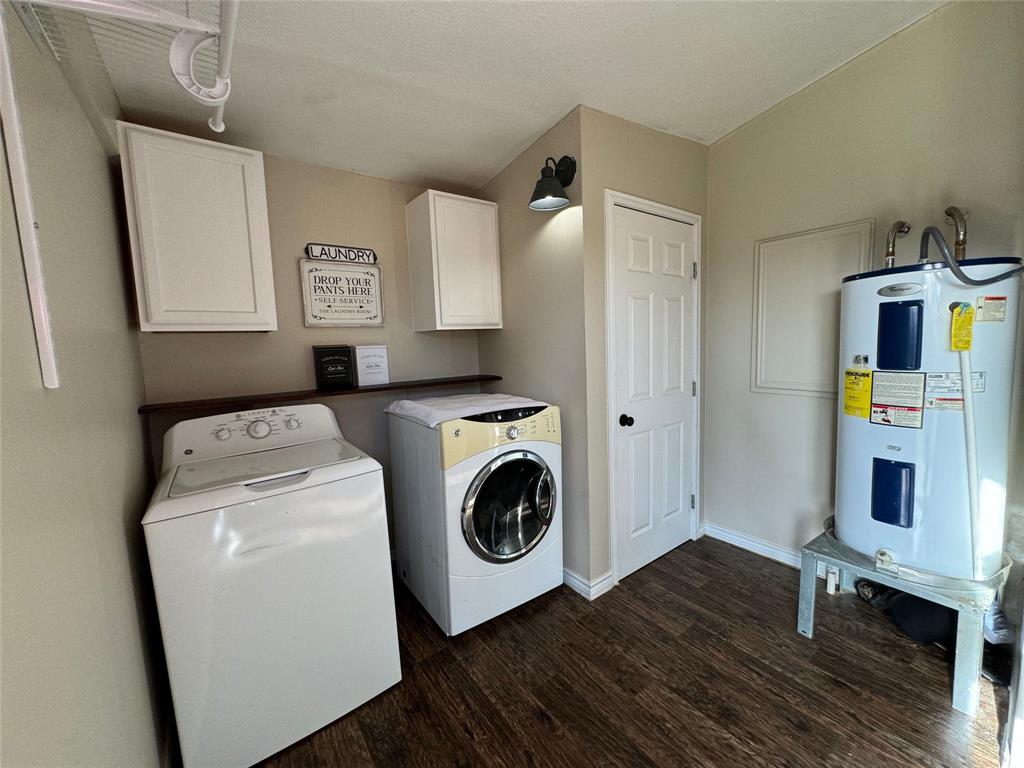1111 West 7th Street Cisco, TX 76437 - Photo 25 of 33 a utility room with dryer and washer