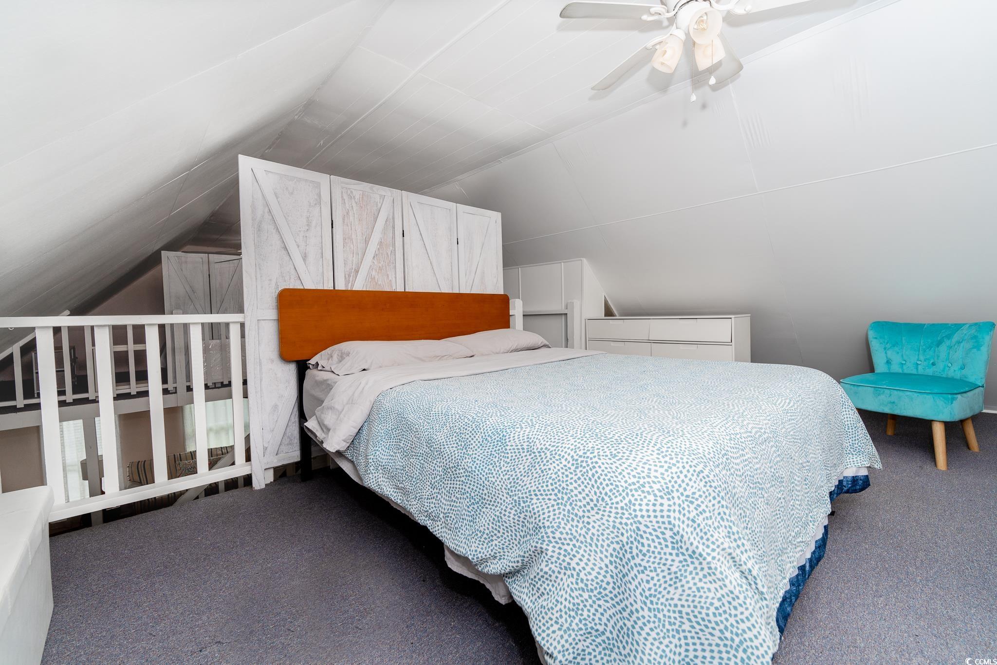 114 North Pinewood Drive Surfside Beach, SC 29575 - Photo 28 of 40 Bedroom featuring carpet, ceiling fan, and vaulted ceiling