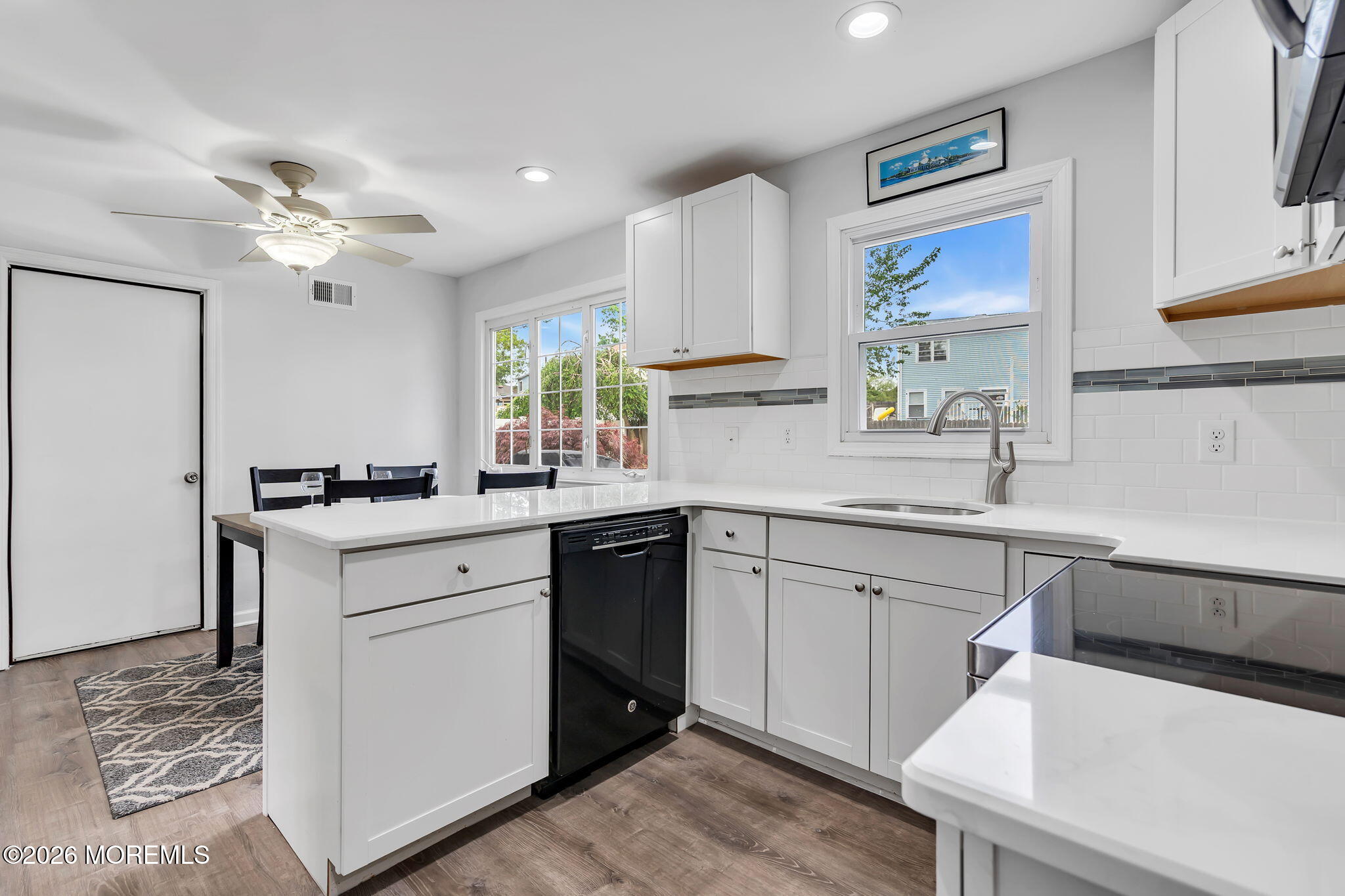 96 Yellowbank Road Toms River, NJ 08753 - Photo 13 of 45 a kitchen with a sink cabinets and window