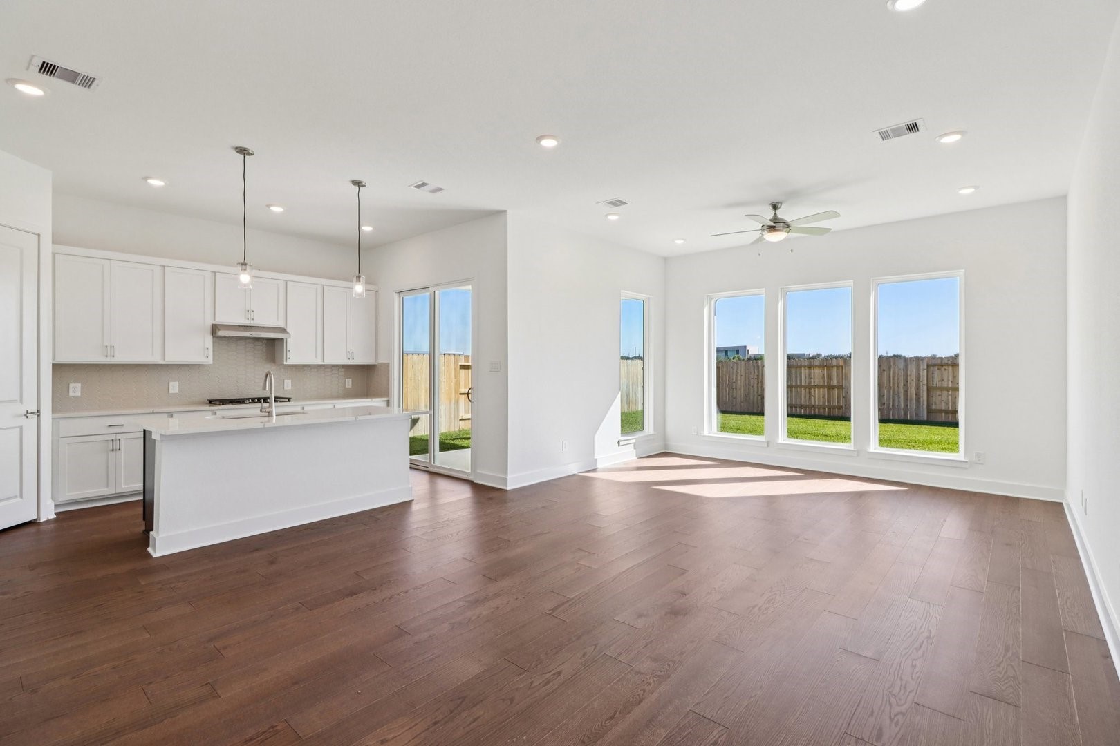 1322 Secret Grv Trail Tomball, TX 77375 - Photo 27 of 35 1322 Secret Grove Great Room + Kitchen