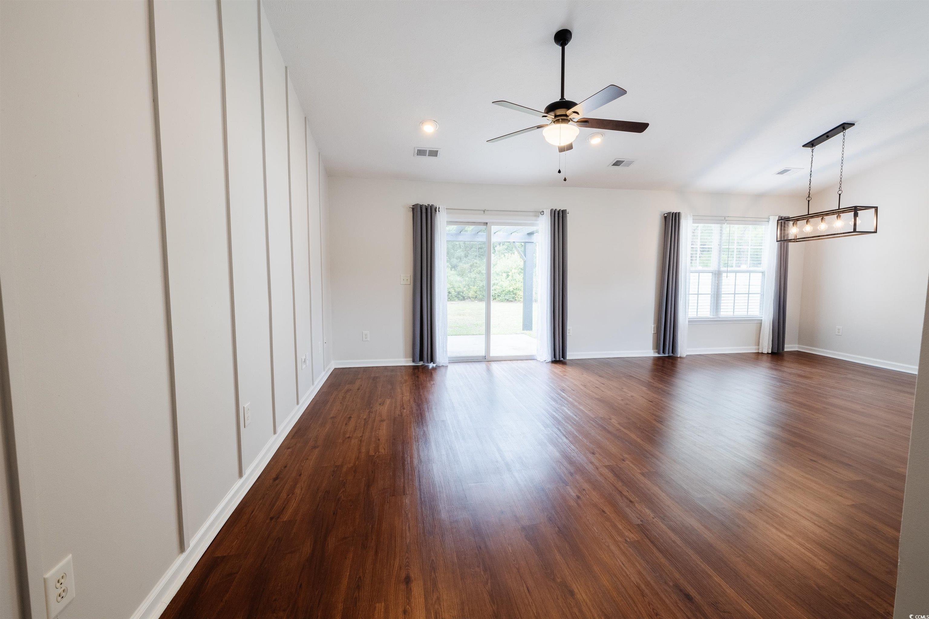 6043 Quinn Road Myrtle Beach, SC 29579 - Photo 5 of 27 Spare room featuring a healthy amount of sunlight,