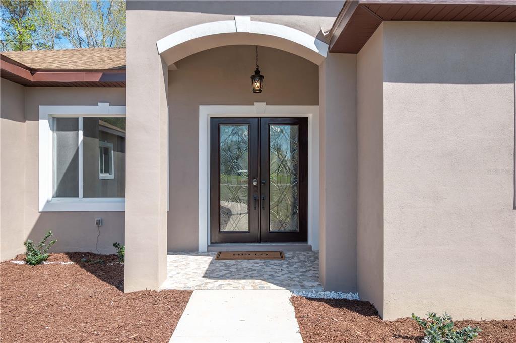 4869 Northwest 101st St Road Ocala, FL 34482 - Photo 41 of 48 Beautiful front porch