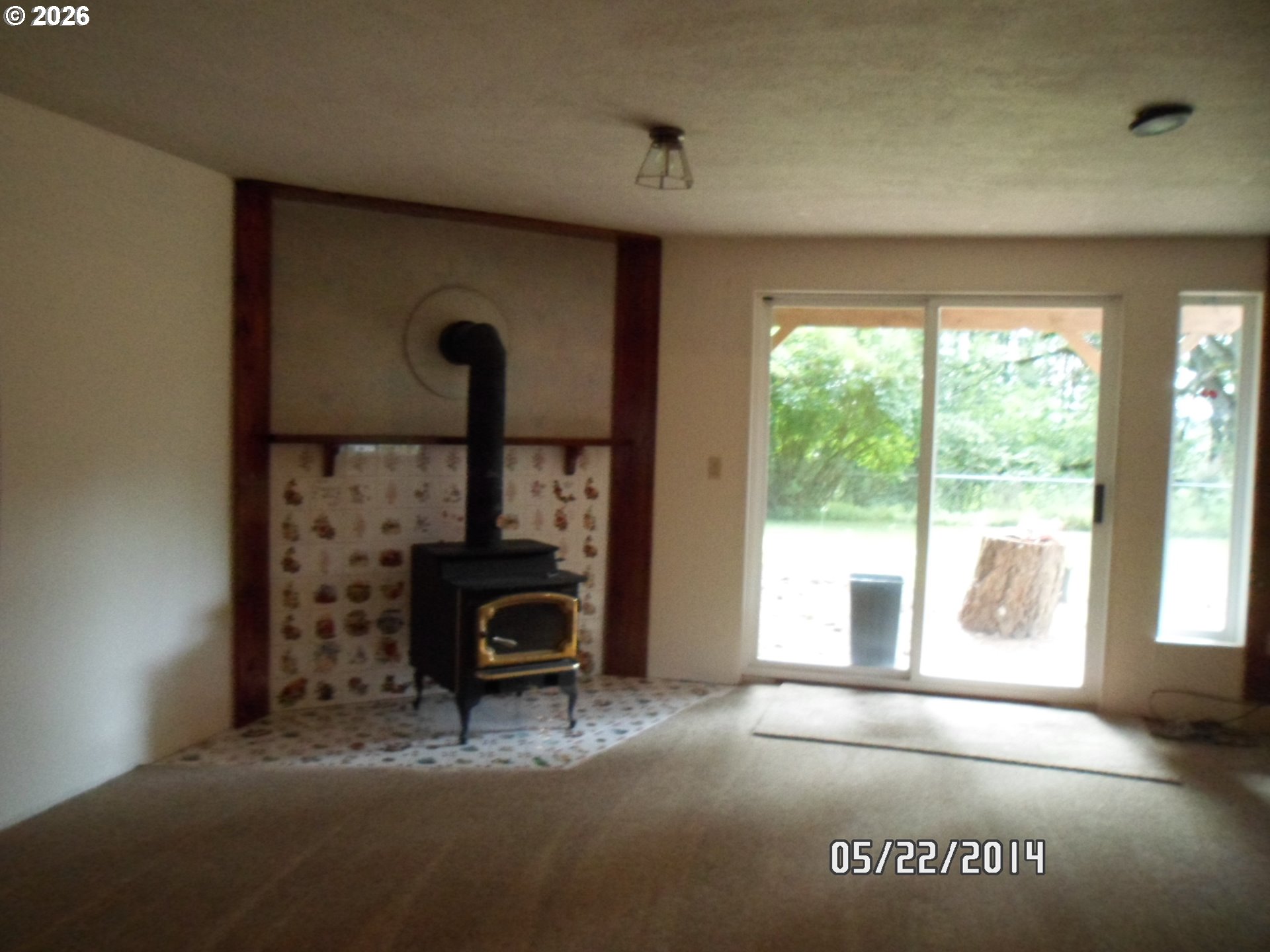 4210 Northeast Breyman Orchards Road Dayton, OR 97114 - Photo 24 of 48 a living room with furniture and a fireplace