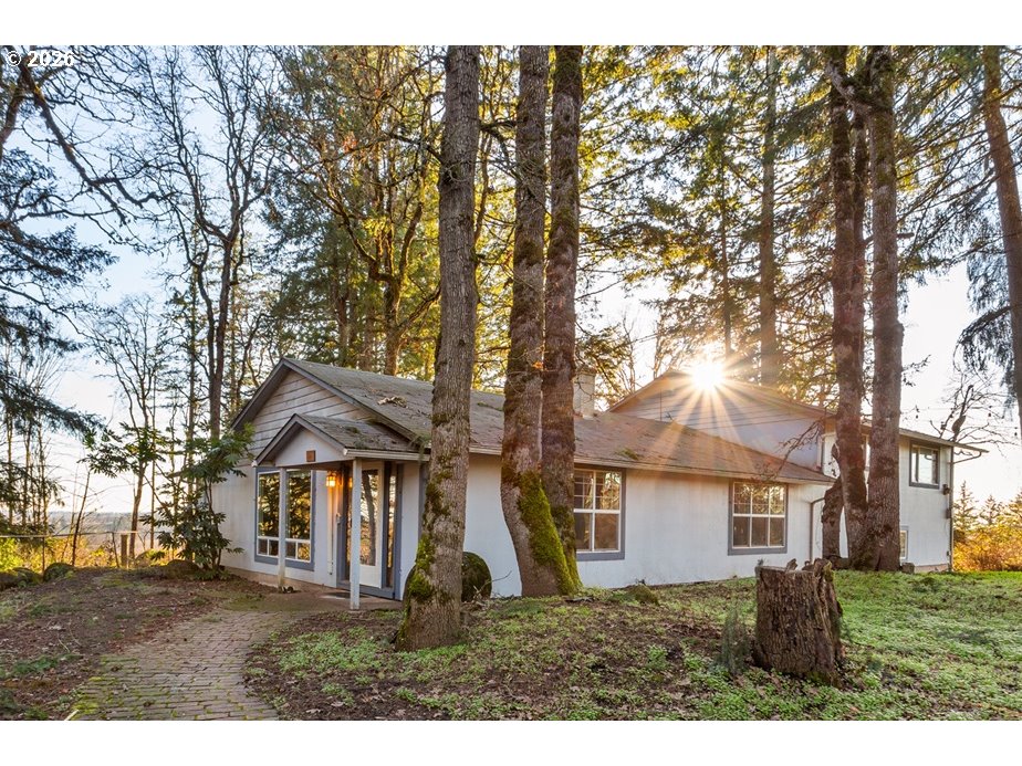 4210 Northeast Breyman Orchards Road Dayton, OR 97114 - Photo 5 of 48 a front view of a house with a yard