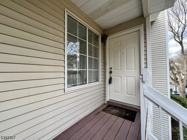 a view of a balcony with window
