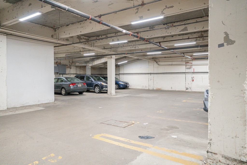 352 West 3rd Street, Unit 9 Boston, MA 02127 - Photo 17 of 18 a view of parking garage with cars