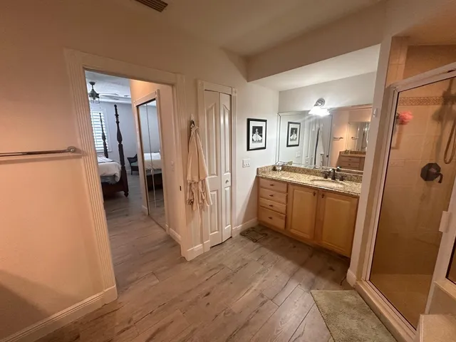 a view of a kitchen from the hallway