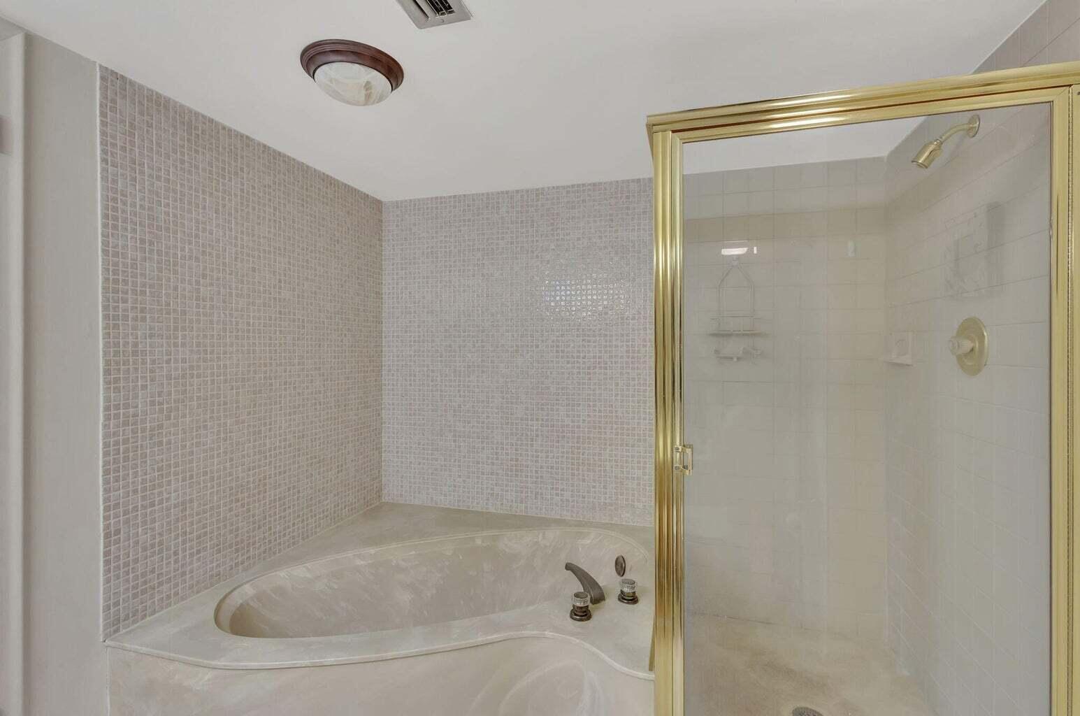 4200 North Ocean Drive, Unit 2201 Singer Island, FL 33404 - Photo 19 of 65 a bathroom with a shower