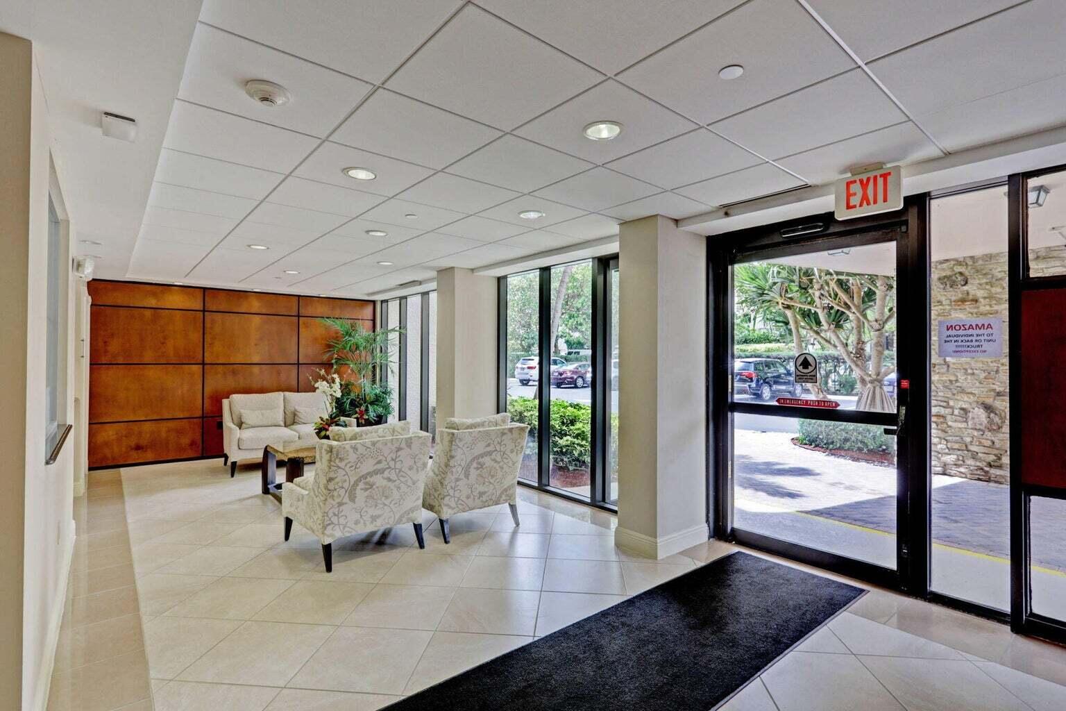 4200 North Ocean Drive, Unit 2201 Singer Island, FL 33404 - Photo 23 of 65 a living room with furniture and large windows