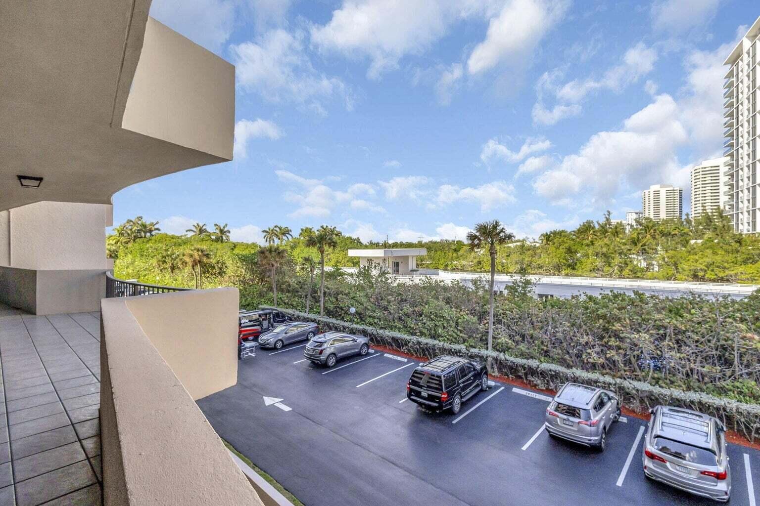 4200 North Ocean Drive, Unit 2201 Singer Island, FL 33404 - Photo 28 of 65 swimming pool view with couple of relaxing chair