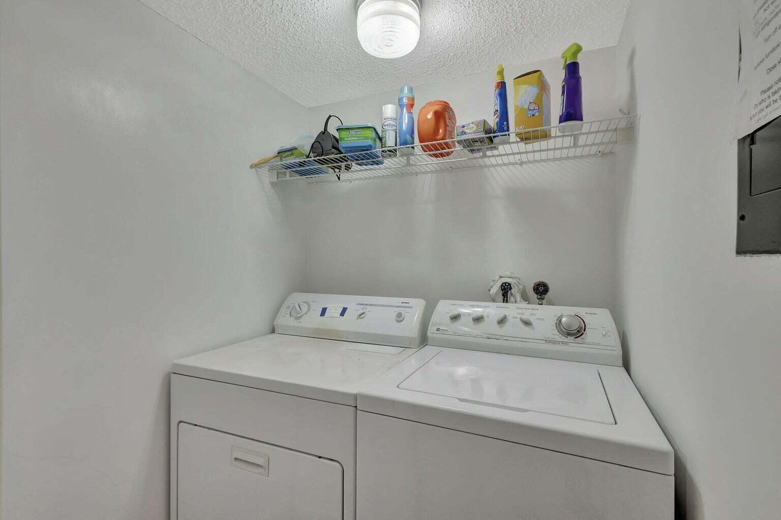 4200 North Ocean Drive, Unit 2201 Singer Island, FL 33404 - Photo 29 of 65 a utility room with dryer and washer