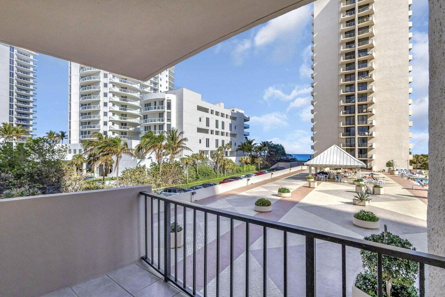4200 North Ocean Drive, Unit 2201 Singer Island, FL 33404 - Photo 31 of 65 a view of a balcony with outdoor seating