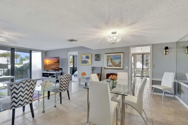 a view of a park with large trees