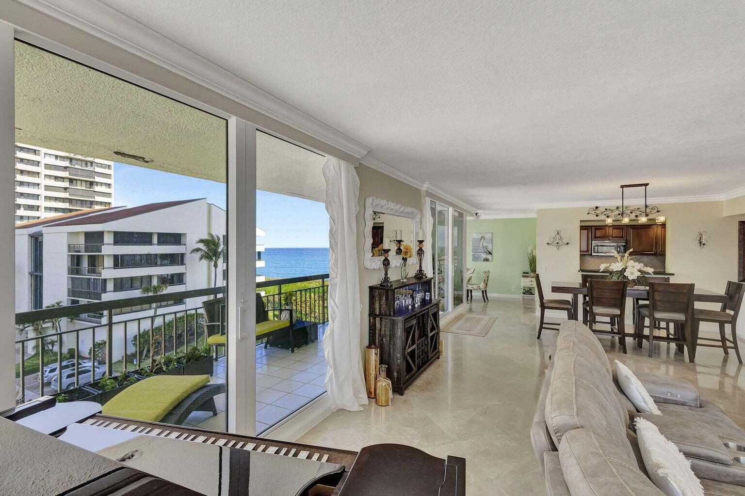 4200 North Ocean Drive, Unit 2201 Singer Island, FL 33404 - Photo 59 of 65 a view of a dining room with furniture window and outside view