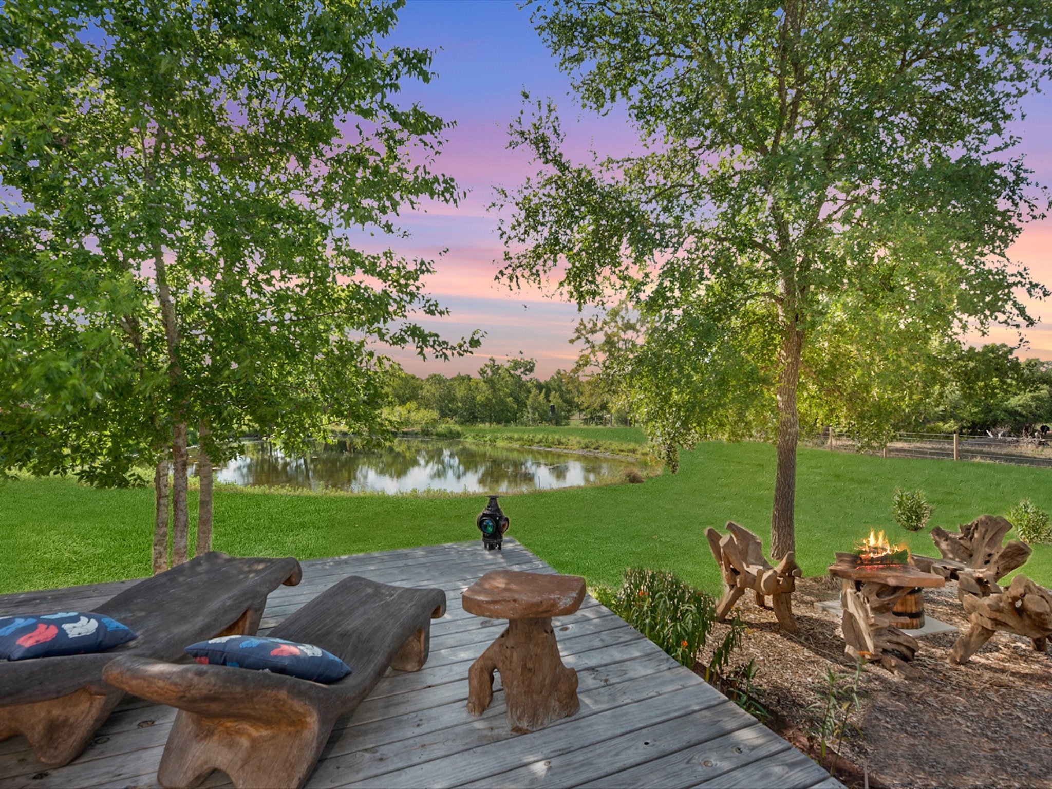 3643 Noak Road Round Top, TX 78954 - Photo 26 of 32 Sitting area for the Airstream that overlooks the pond. Located in the back portion of the property, very private.