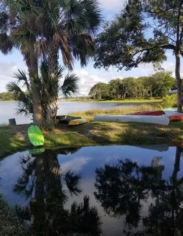 a view of a lake with outdoor space