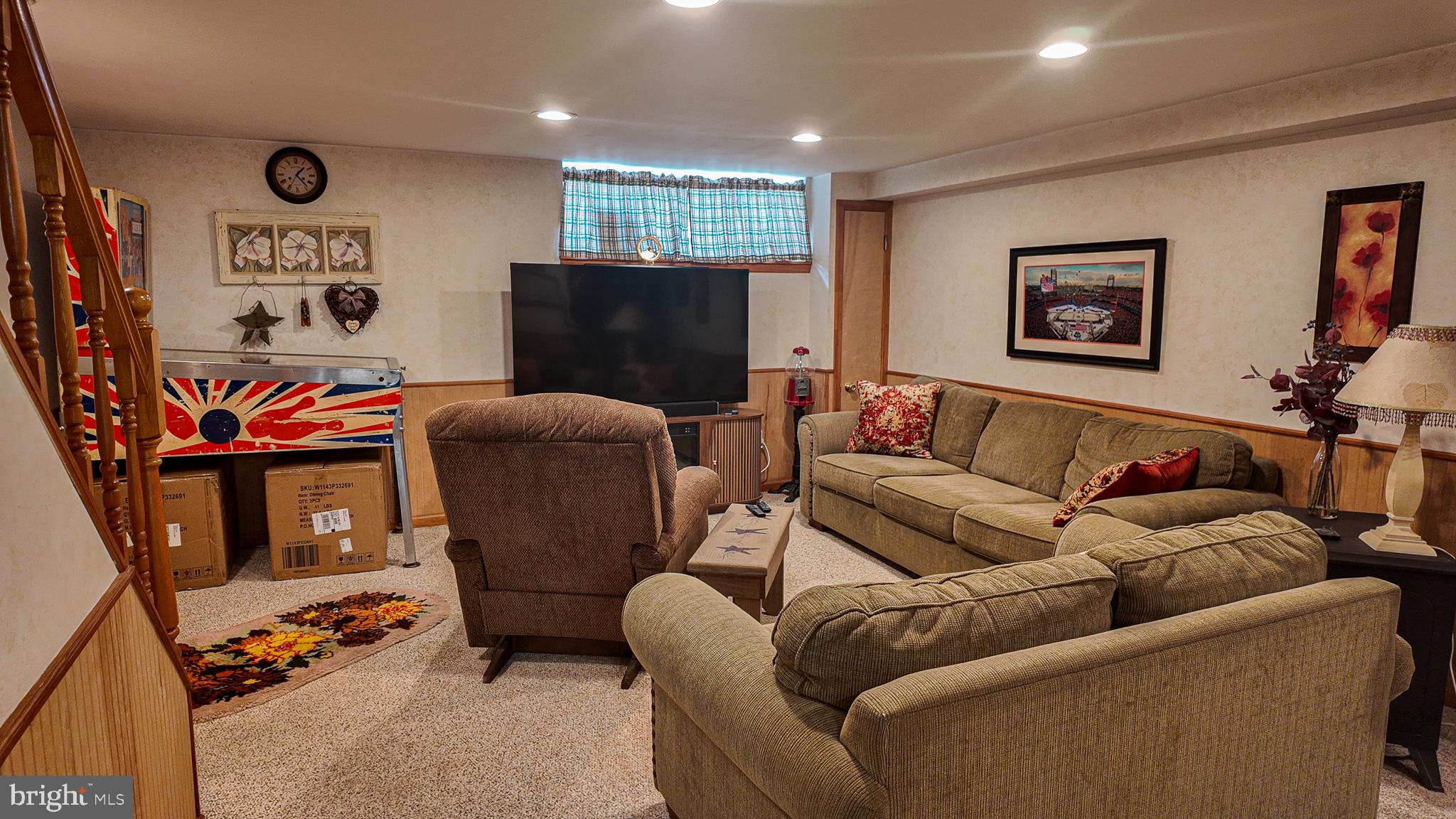 3330 Fordham Road Philadelphia, PA 19114 - Photo 22 of 28 a living room with furniture and a flat screen tv