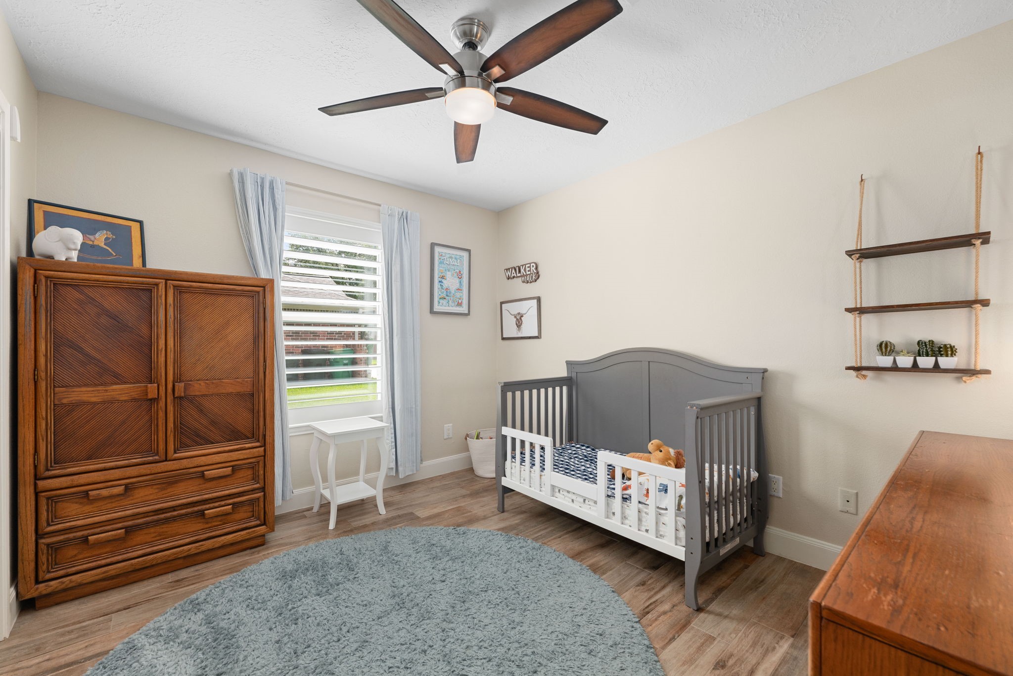 1915 Mercoal Drive Spring, TX 77386 - Photo 23 of 50 Bright secondary bedroom with a ceiling fan, generous closet space, and large window.