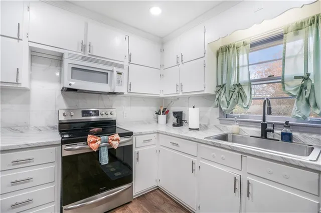 a view of a dining room with furniture