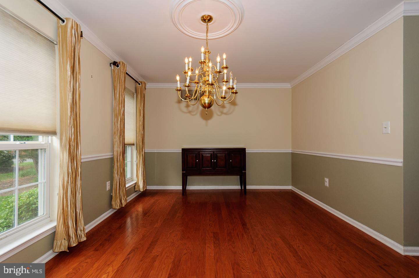109 Deer Run Court Pennington, NJ 08534 - Photo 5 of 25 a view of a room with wooden floor and staircase