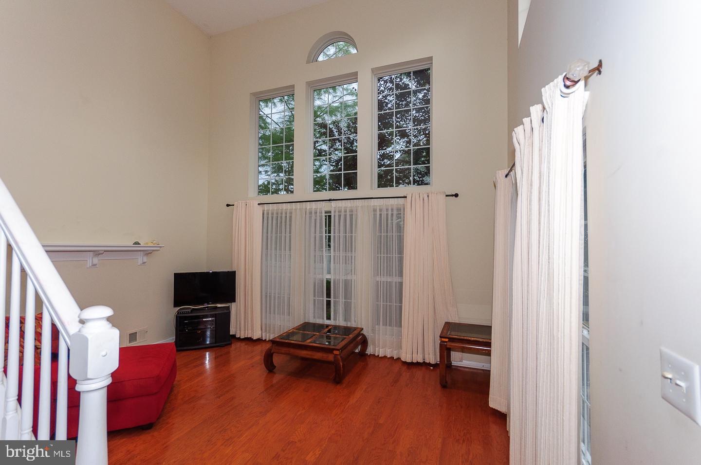 109 Deer Run Court Pennington, NJ 08534 - Photo 6 of 25 a view of a livingroom with furniture and a window