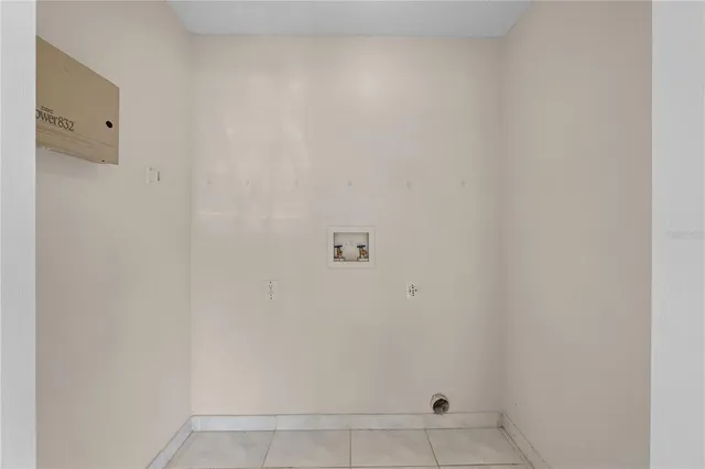 a view of empty room with furniture and cabinet