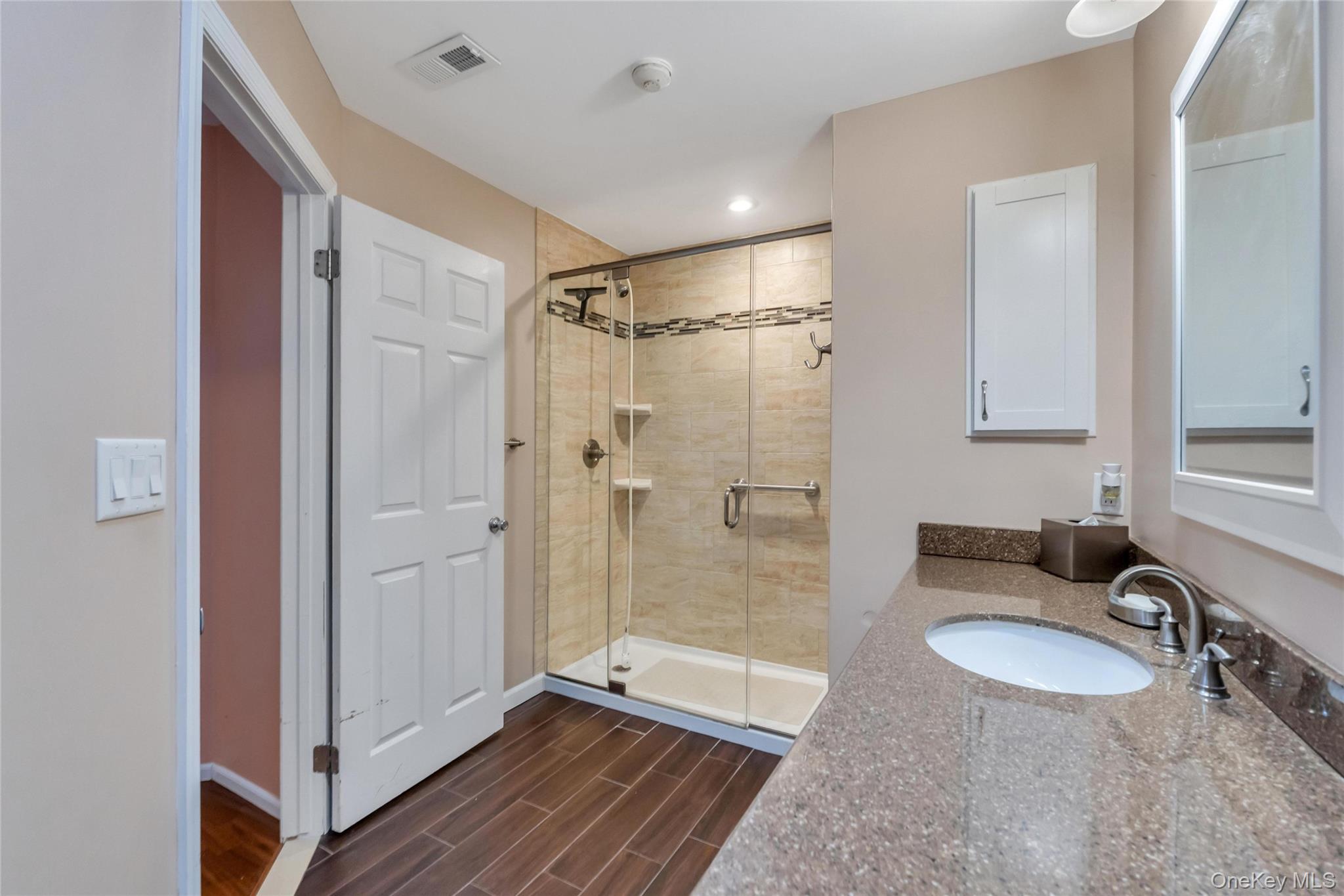 22 Kettle Hole Road Manorville, NY 11949 - Photo 25 of 39 Master bedroom bathroom