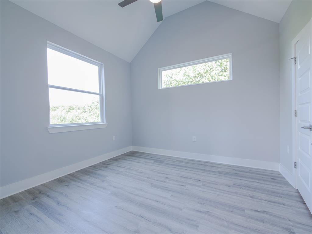 1042 Rosemont Street, Unit 1 Austin, TX 78723 - Photo 20 of 31 a view of an empty room and window