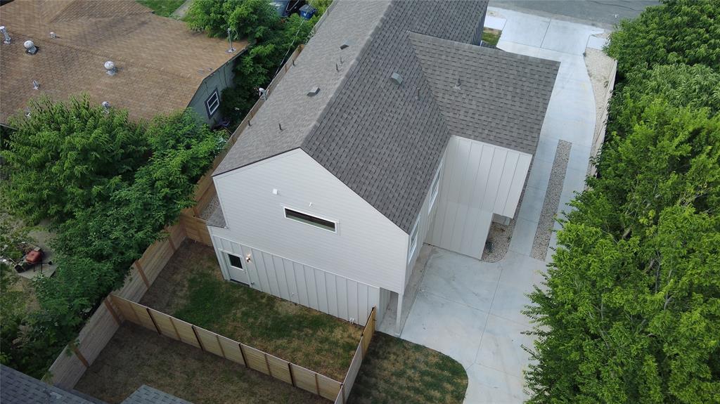 1042 Rosemont Street, Unit 1 Austin, TX 78723 - Photo 30 of 31 an aerial view of a house with stairs and a yard