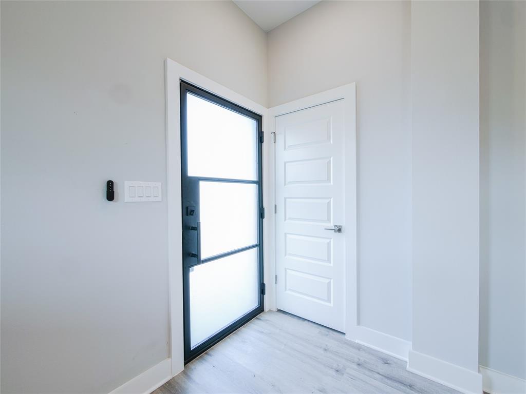 1042 Rosemont Street, Unit 1 Austin, TX 78723 - Photo 6 of 31 a view of empty room with closet and window