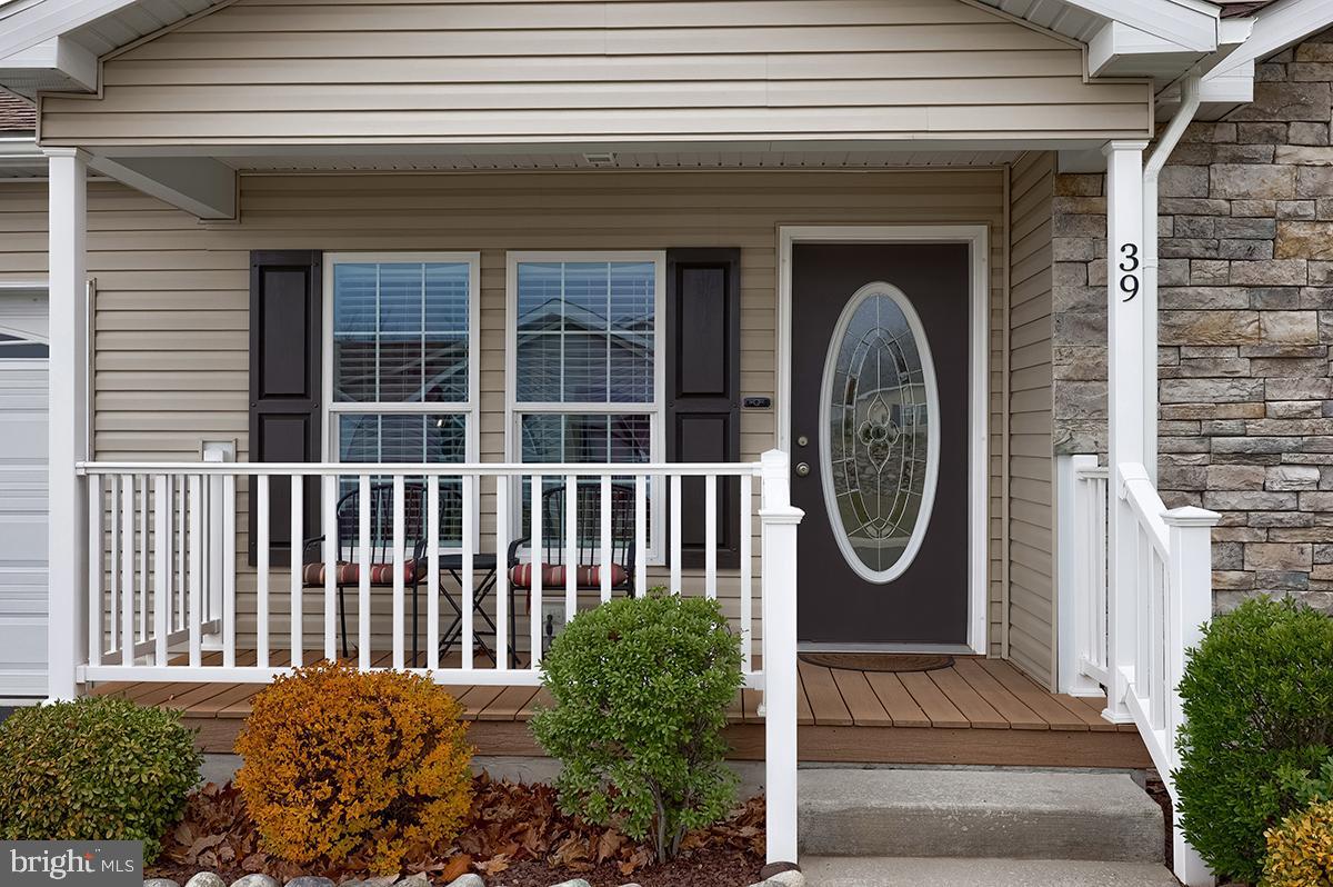 39 Westin Road Douglassville, PA 19518 - Photo 3 of 37 a front view of a house with garden