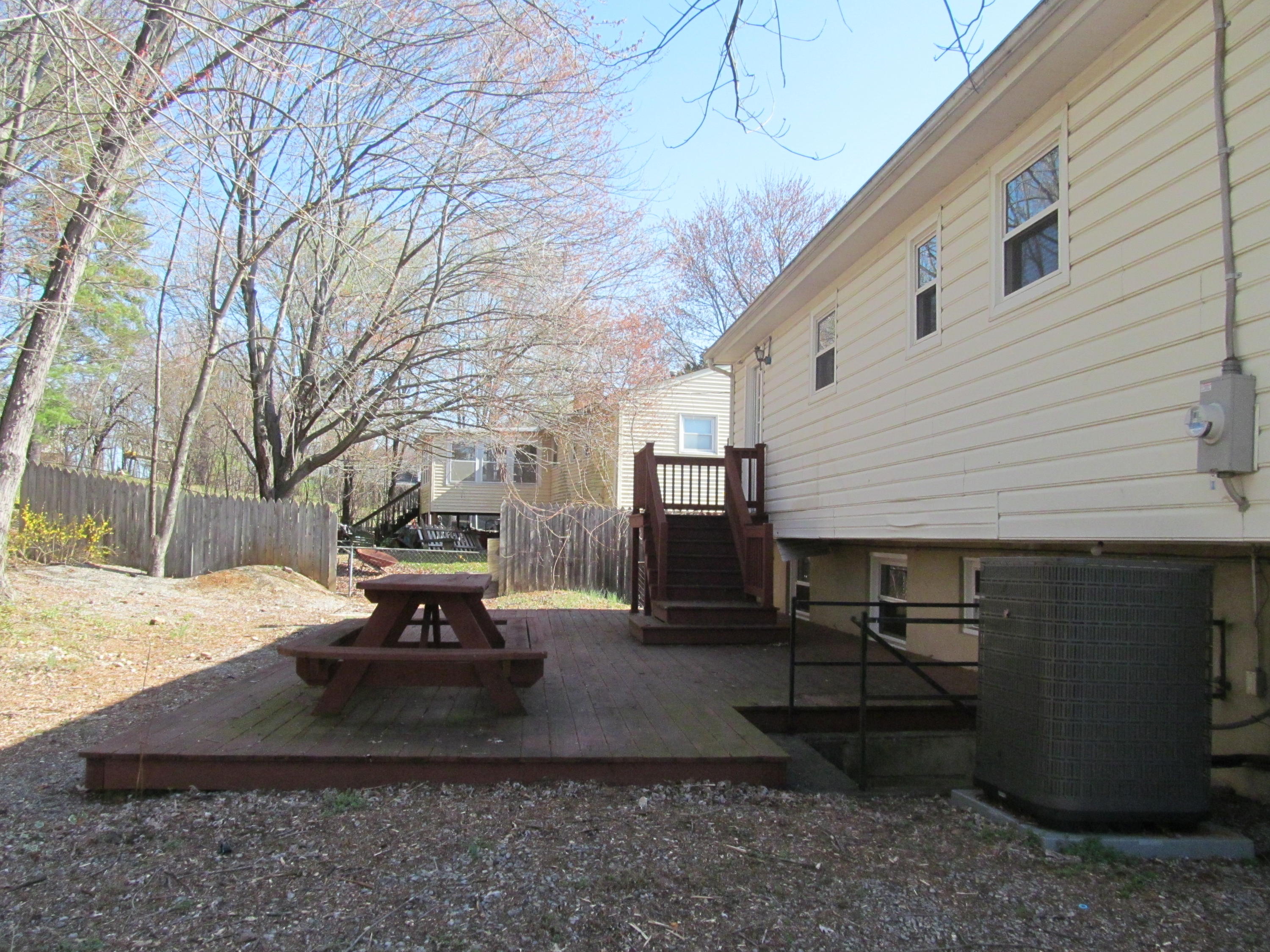624 Ramada Road Vinton, VA 24179 - Photo 24 of 25 a view of a backyard with table and chairs