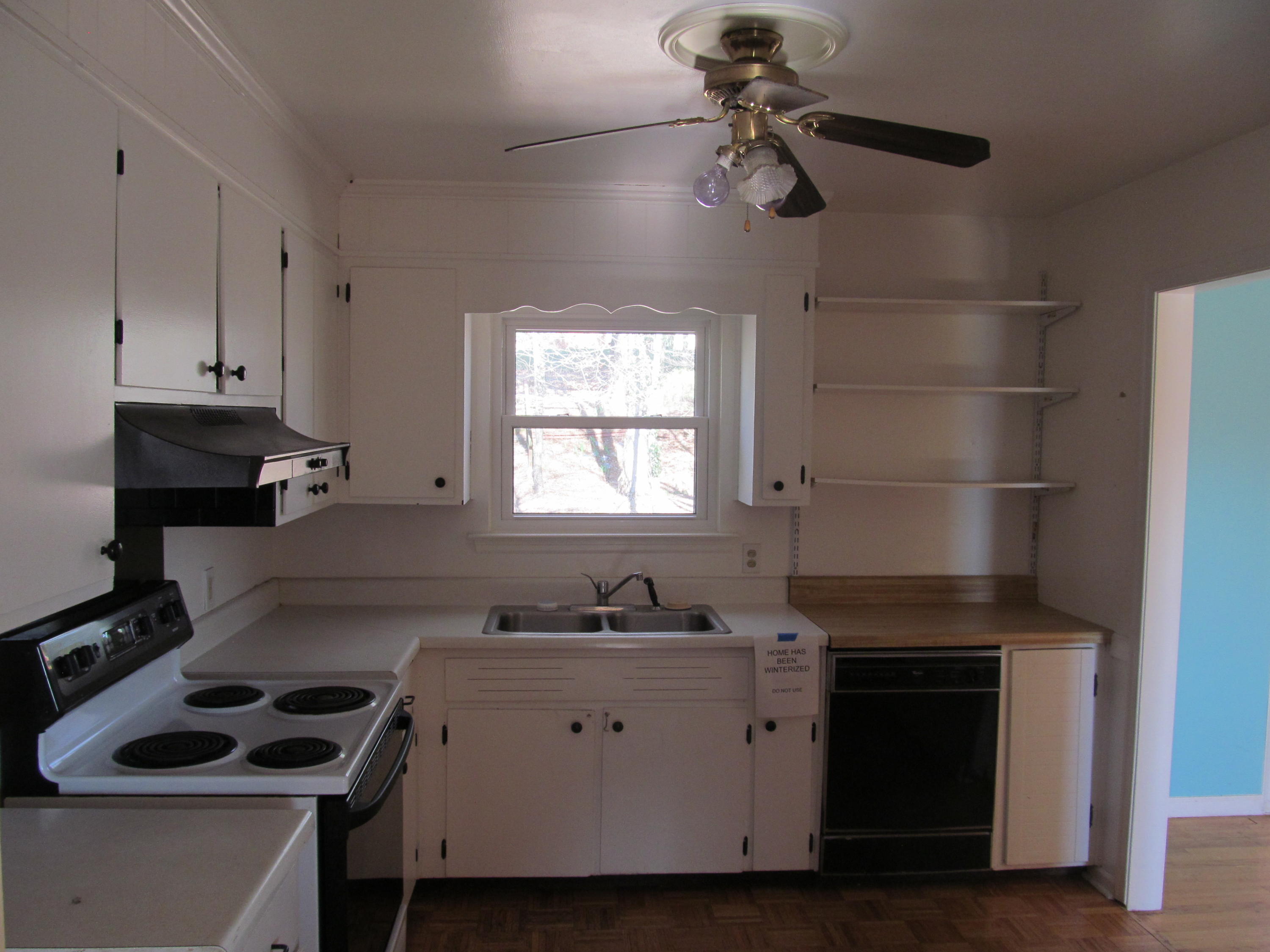 624 Ramada Road Vinton, VA 24179 - Photo 25 of 25 a kitchen with a cabinets and white appliances